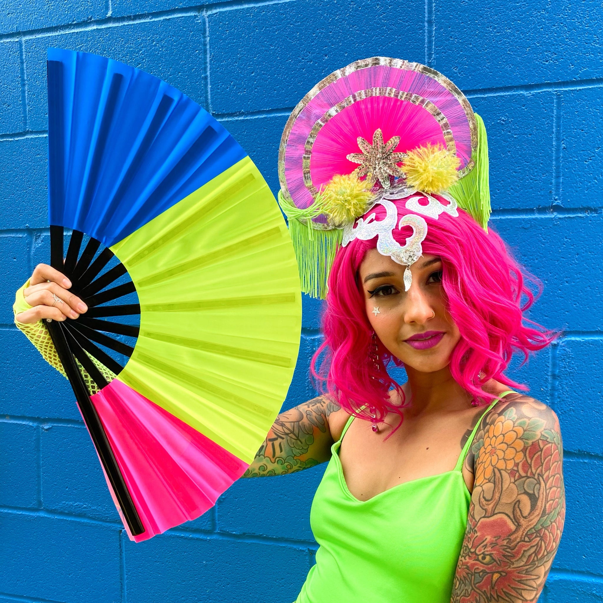 Girl holding pansexual flag clack fan ready for Pride Parade